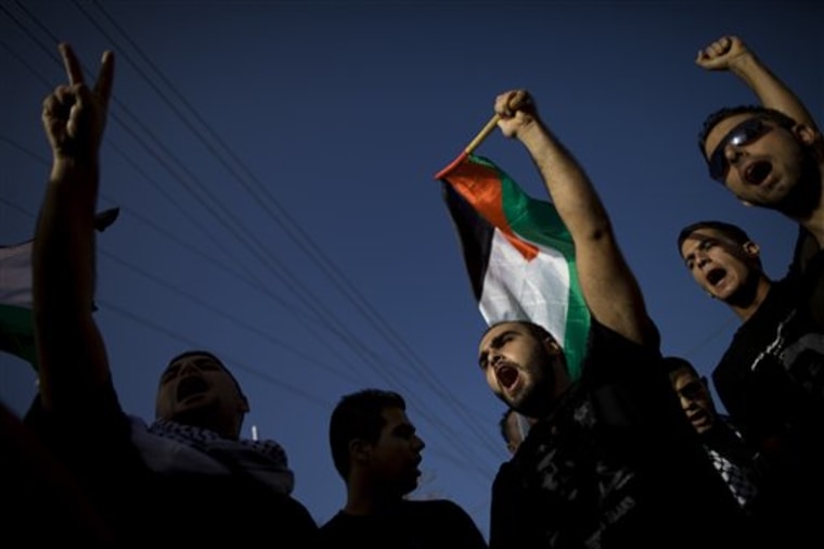Palestinians participate in a rally marking 10-years since the starting of the second Intifada, in Kafar Kana, in northern Israel, on Friday. It has been 10-years since Palestinians began an uprising that swept away peace talks, triggered a ferocious reaction by the Jewish state and left thousands dead on both sides.